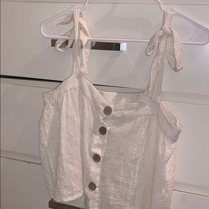 white tank with buttons
